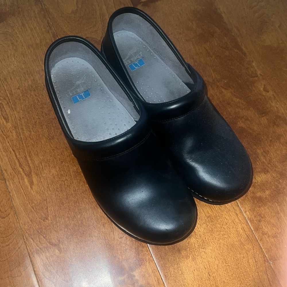 Dansko clogs , like new